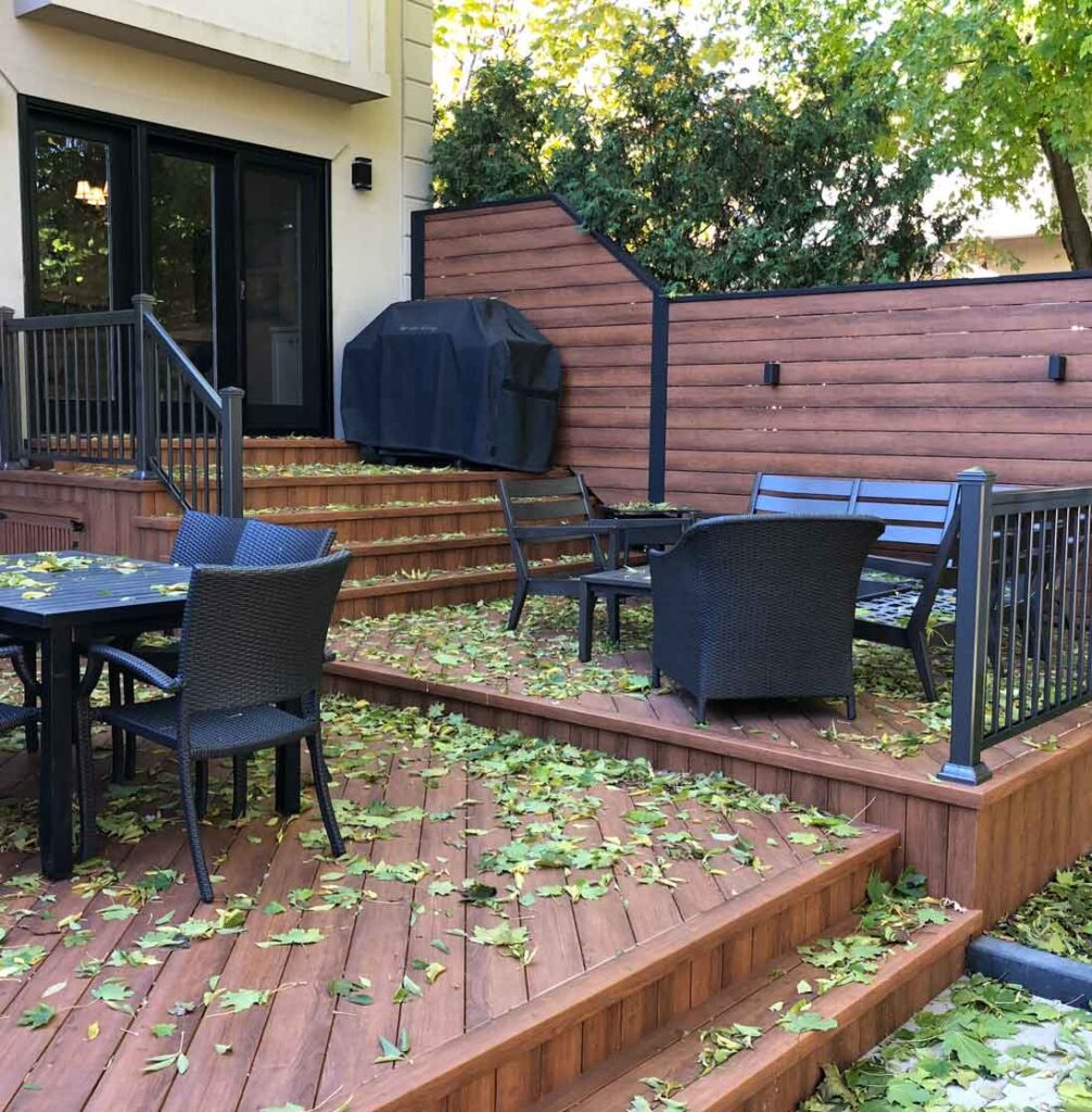 Multi-level deck that breaks up the elevation to create separate outdoor living spaces with more visual interest