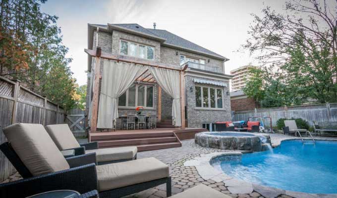 The Best Pool Designs for Sloped Backyards