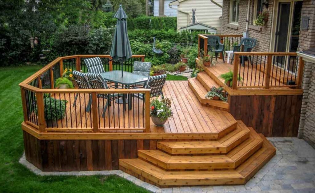 Traditional two-level cedar deck creating a warm, cozy outdoor living space
