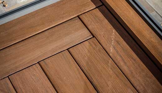 Modern composite deck with picture frame border and clean butt joints for a sharp, contemporary finish