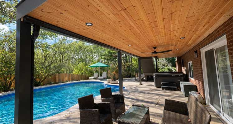 Covered outdoor living area built under a waterproof deck